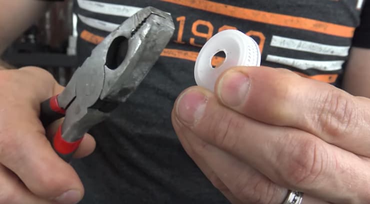 Use a pair of pliers to clean out any excess for the hole