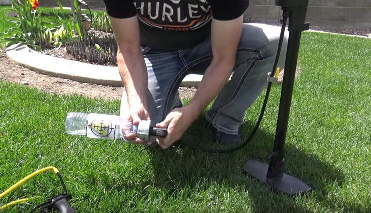 Pumping the bottle up to 50-60 psi with a bike pump